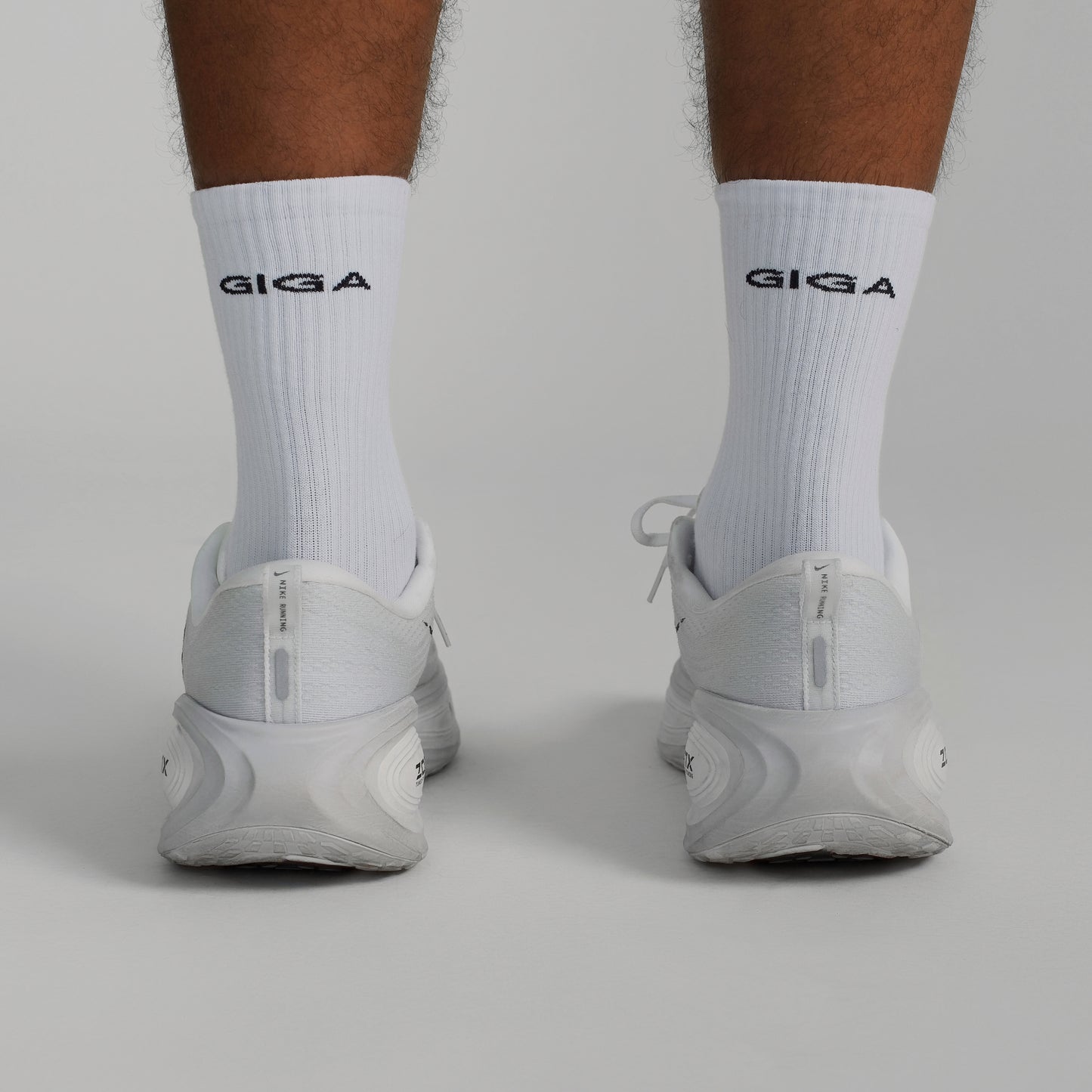 GIGA Socks in white back view with shoes