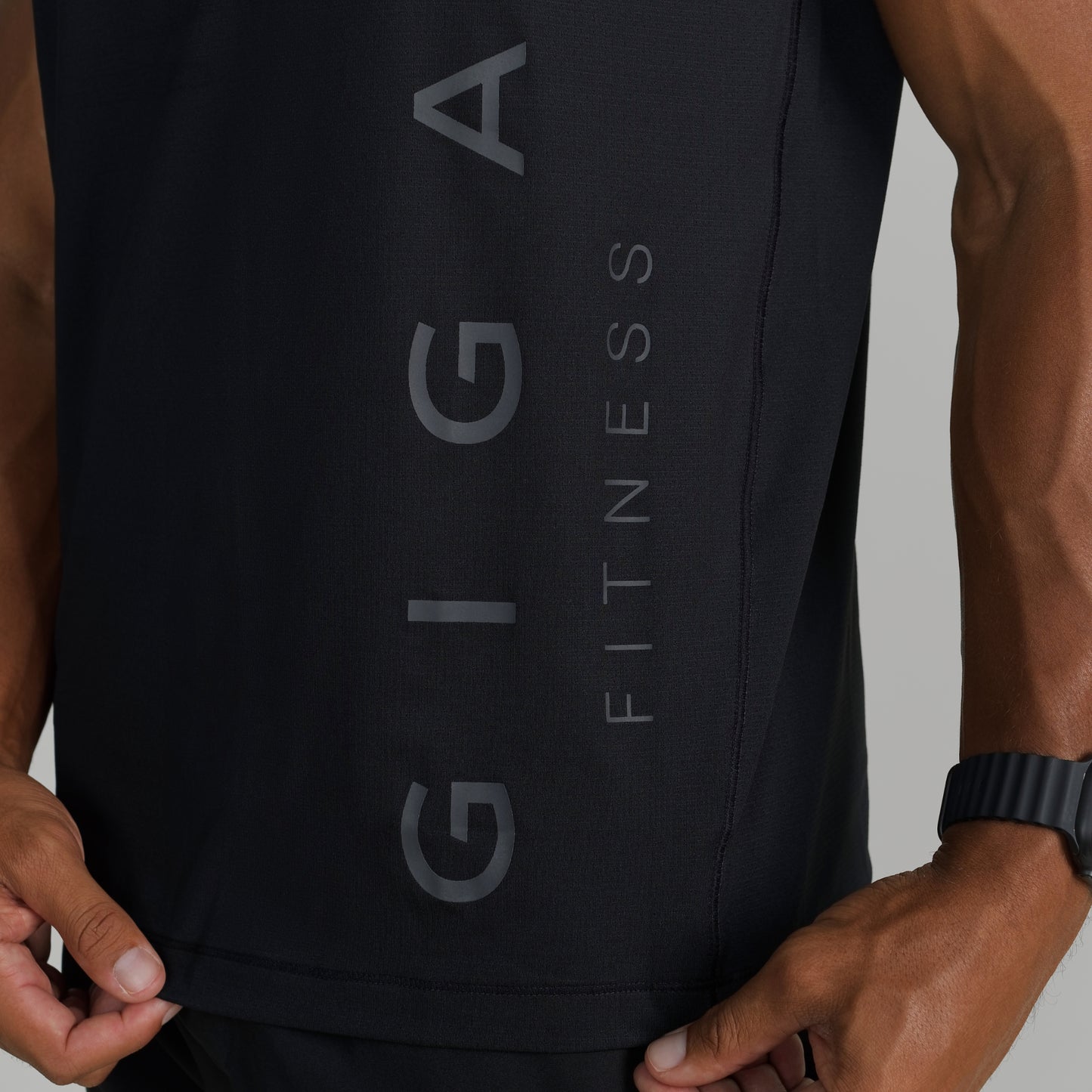 Close-up of GIGA logo on black Core Tank