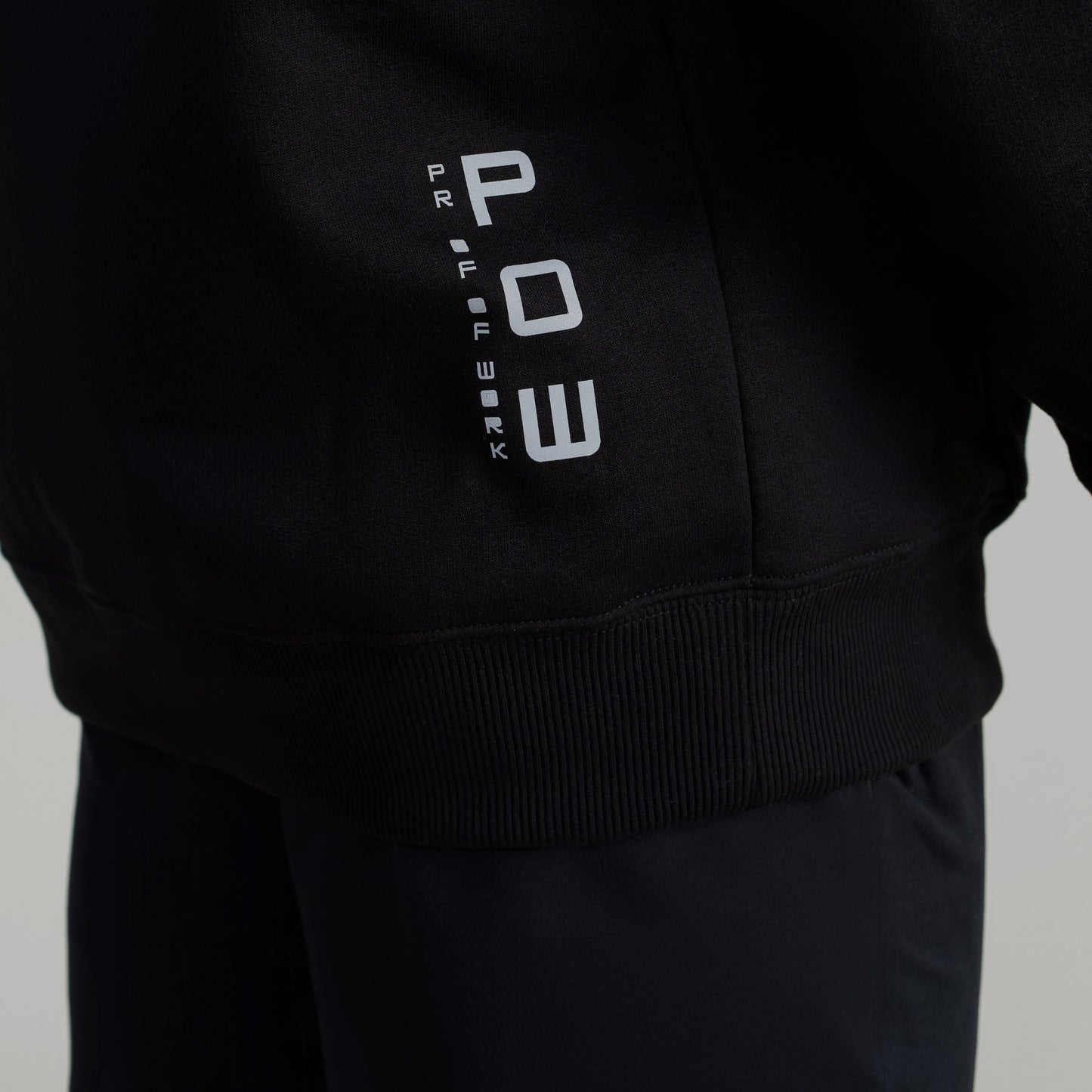 GIGA Recovery Hoodie in black side POW logo detail